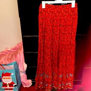 Natural life size small skirt orange gold and blue flower print! Elastic waist